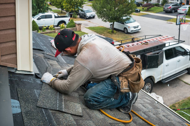 Professional Roofing technician working in Cambridge, WI